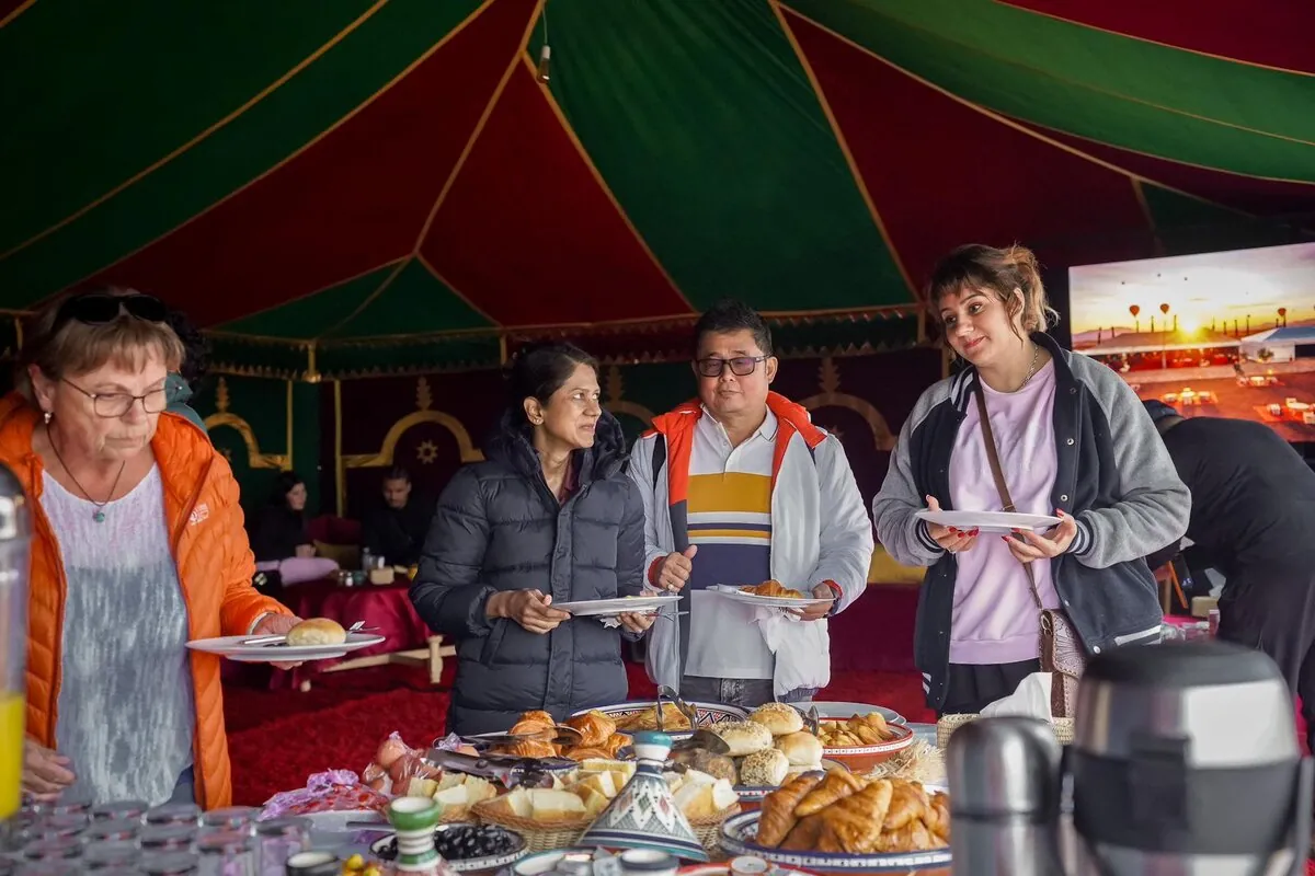 Guests enjoying breakfast in traditional Moroccan tent